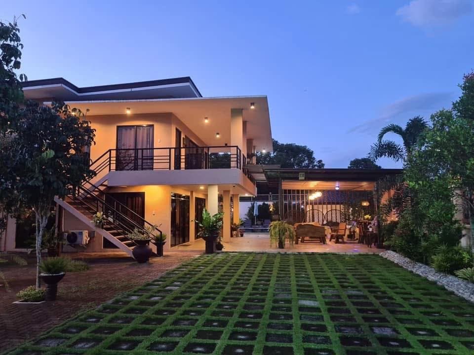 Casa Venice Resort main building at dusk
